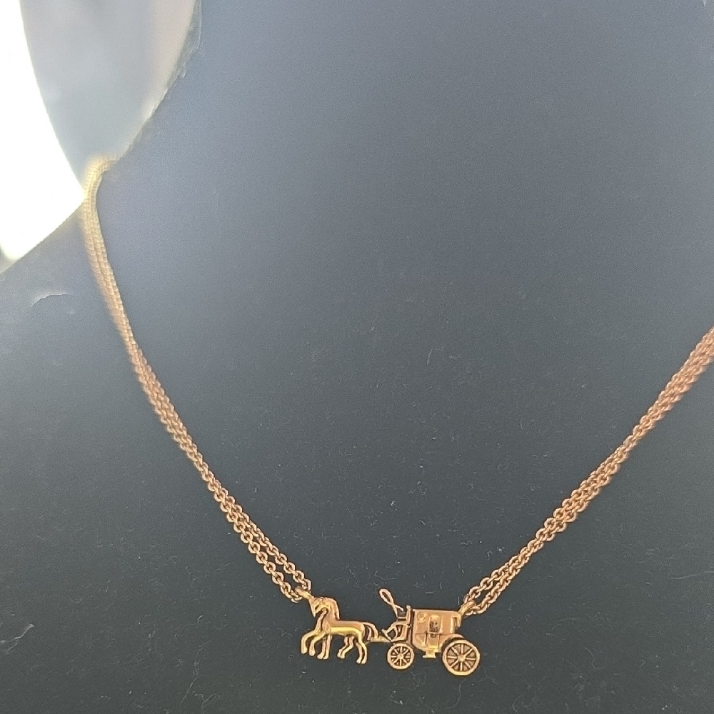 Elegant Gold Carriage Necklace